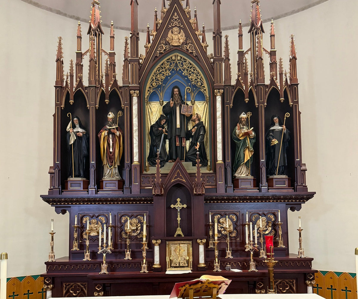 Carved Gothic high altar with saint statues, St. Benedict Catholic Church