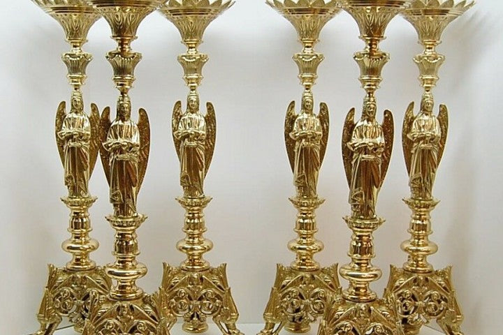 Set of six gilded brass angel altar candlesticks