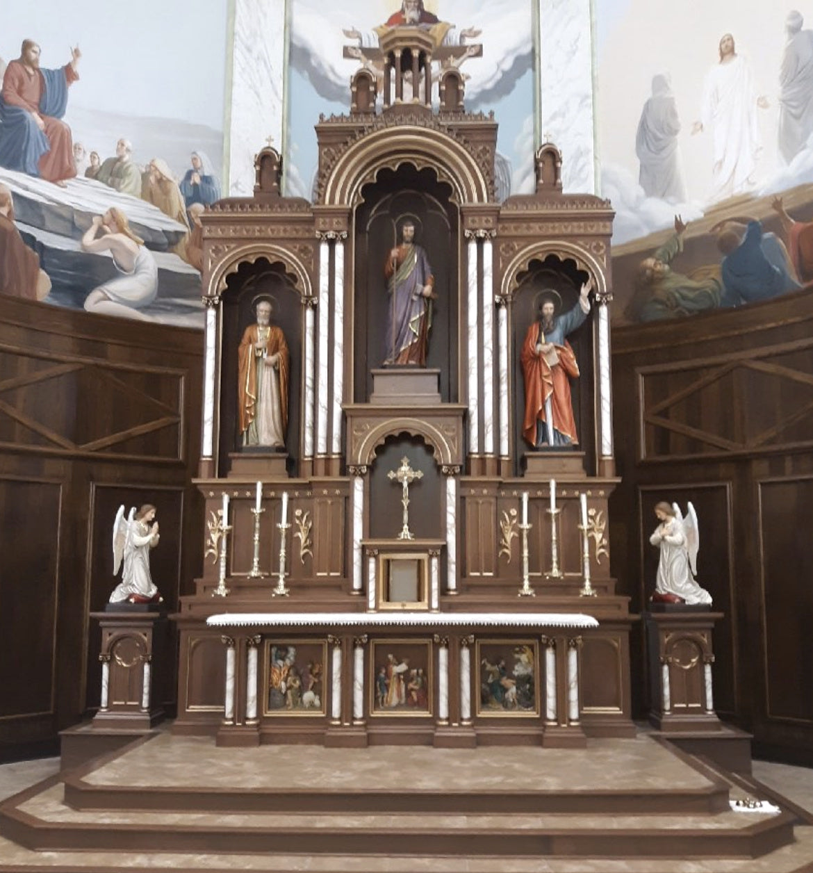 New marble, oak and walnut high altar and reredos with carved statues in the sanctuary of St. Joseph's Catholic Church, Ohio