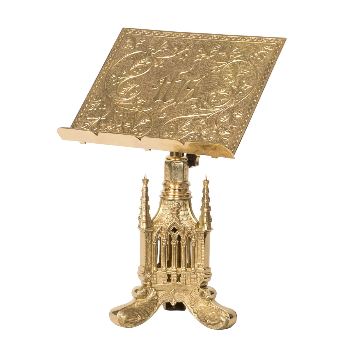 Gold-tone missal stand with embossed IHS book rest on a tall Gothic tower base with arched windows