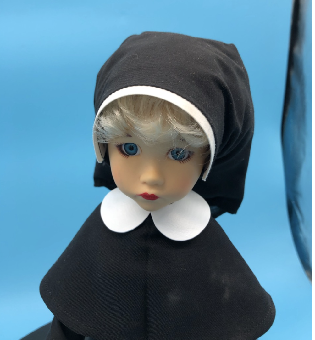 Nun Doll with Wooden Stand