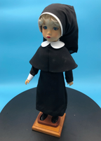 Nun Doll with Wooden Stand