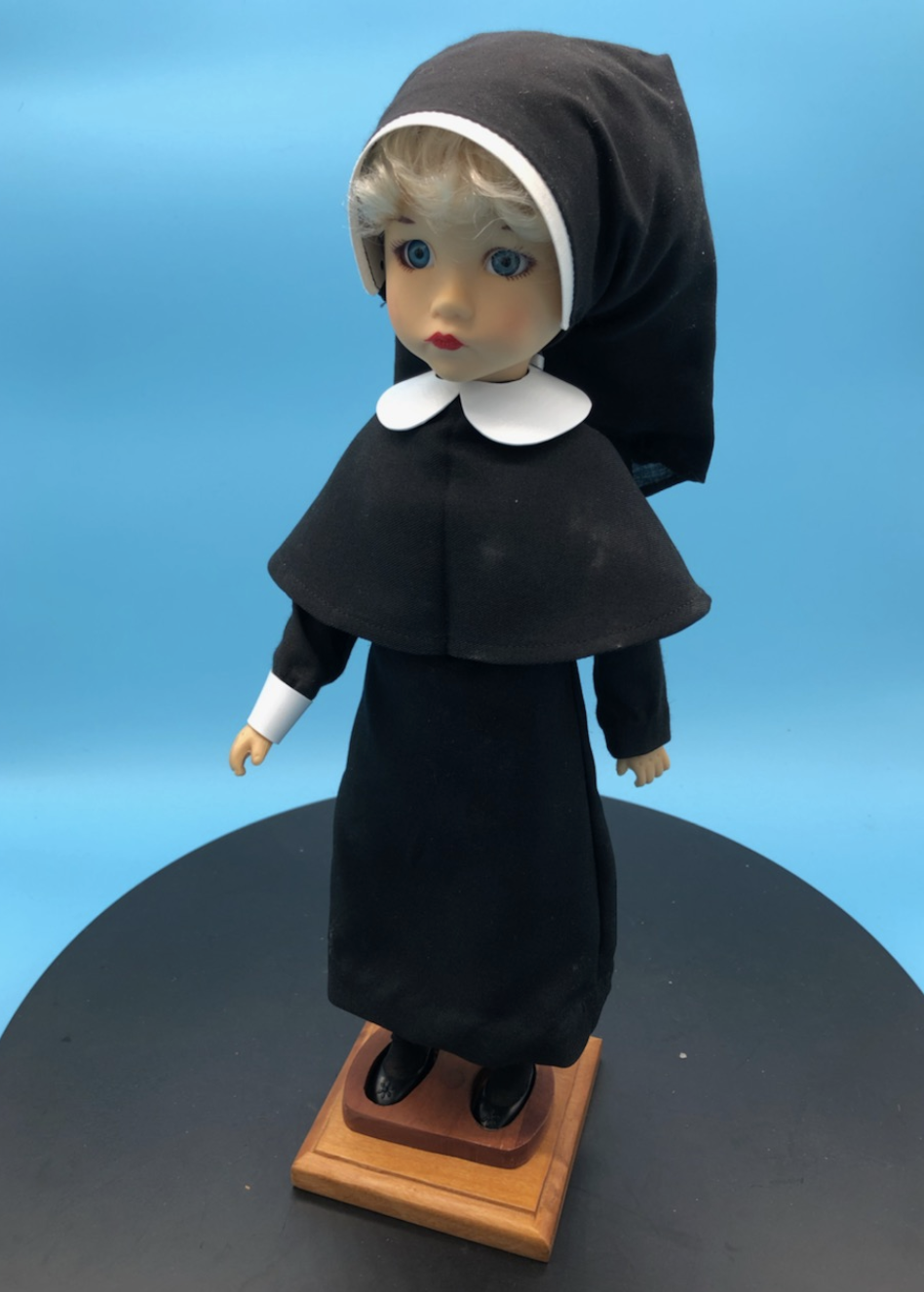 Nun Doll with Wooden Stand