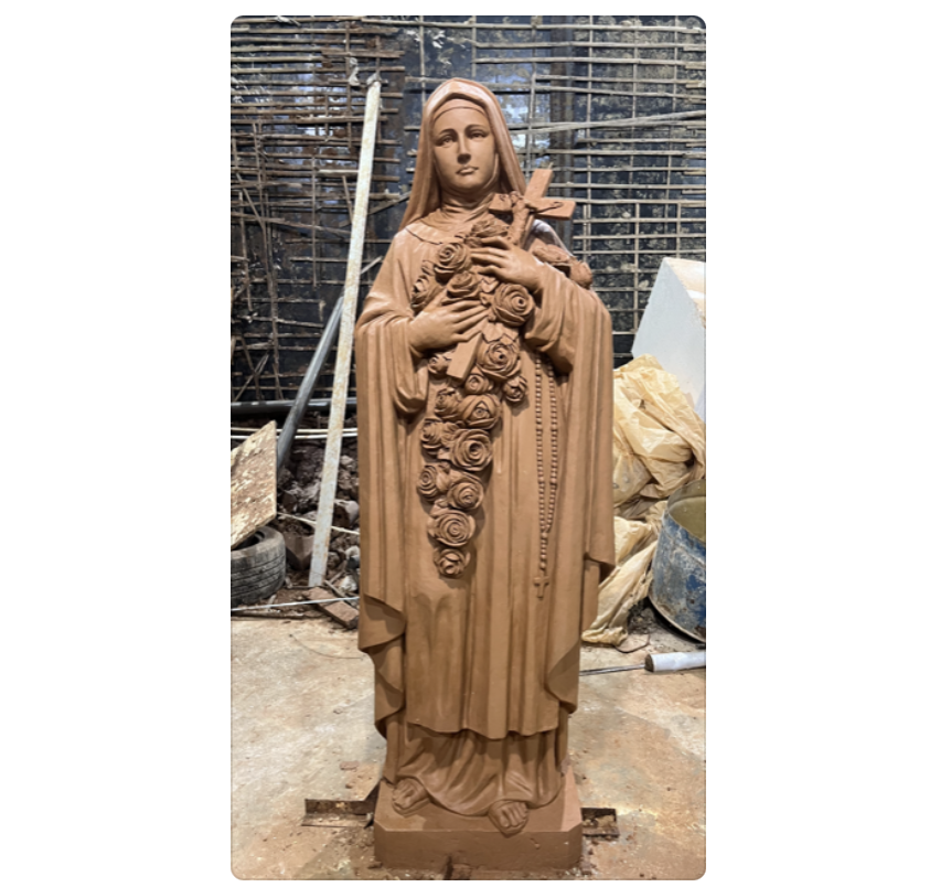 St Therese of the Little Flower shown in clay